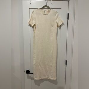 Cream colored short sleeved bodycon dress